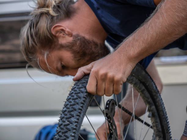 istock Man repairing mountain bike 1278393262