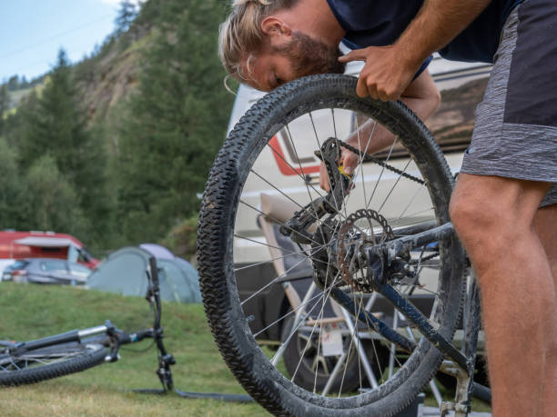 istock Man repairing mountain bike 1278393469