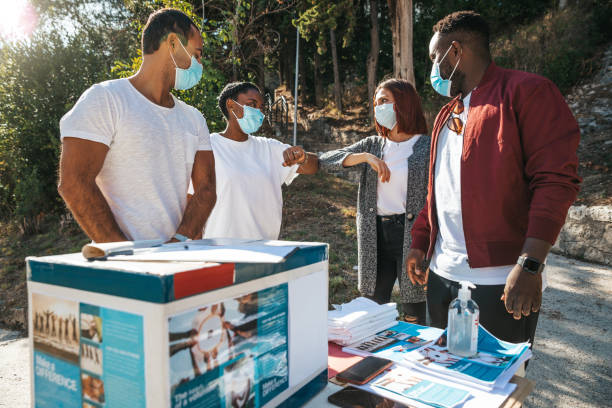 istock Diverse volunteers fundraising for a nonprofit organization 1278394263