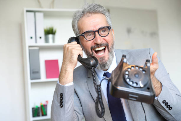 istock Smiling mature businessman in the office 1278395243