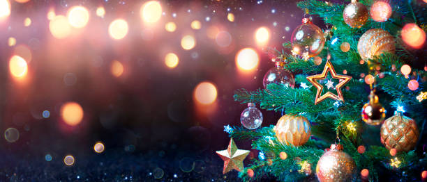 istock Abstract Christmas Tree With Baubles And Bokeh Shiny Lights 1278396368