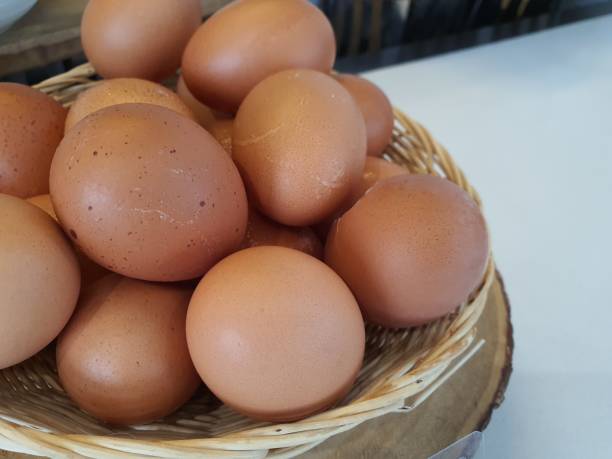 istock Hen / chicken eggs basket on the hey 1278405090