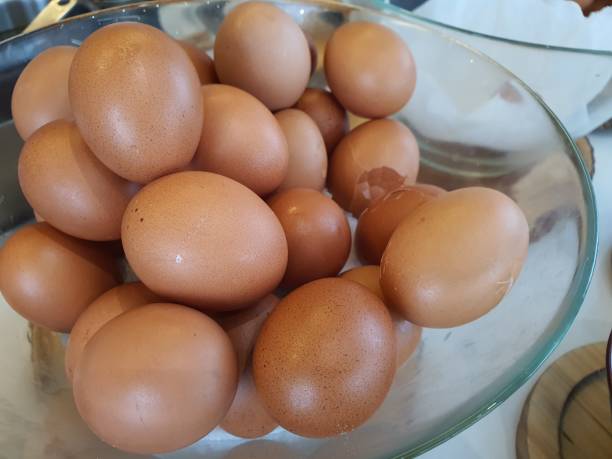 istock Hen / chicken eggs basket on the hey 1278405094