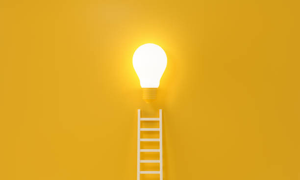 istock Ladder reaches up to a lit light bulb representing an Idea, creativity, invention concept. 3d rendering. 1278411418