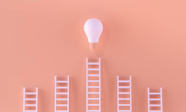 istock Stairs reaching a light bulb in a minimalist pastel orange background. idea, brainstorming, inspiration concept. 3D rendering. 1278411421