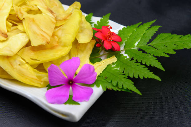 istock Fried durian with flowers and leaves in dish on table 1278417070