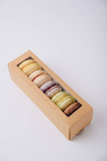 istock Several colorful macaroon cakes on a colored background 1278425296