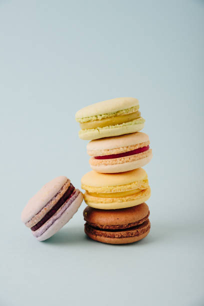 istock Several colorful macaroon cakes on a colored background 1278425299