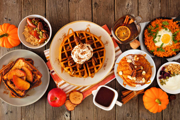 istock Fall breakfast or brunch buffet table scene against a dark wood background. Top down view. 1278426505