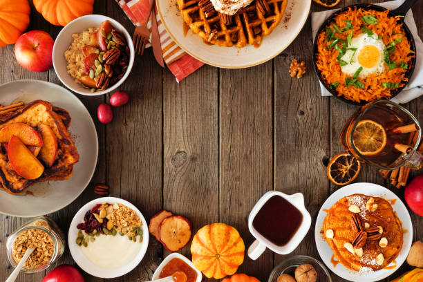 istock Assorted autumn breakfast or brunch items. Frame against a dark wood background with copy space. 1278427595