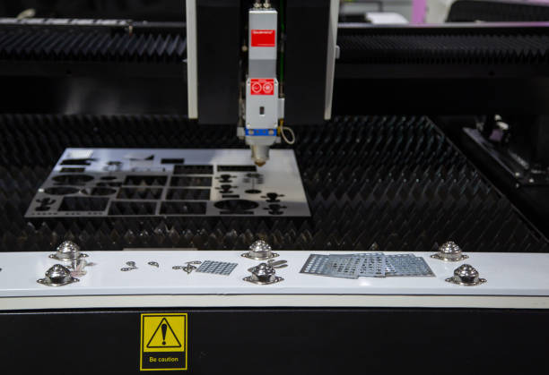 istock CNC fiber laser cutting machine cutting metal sheet 1278430856
