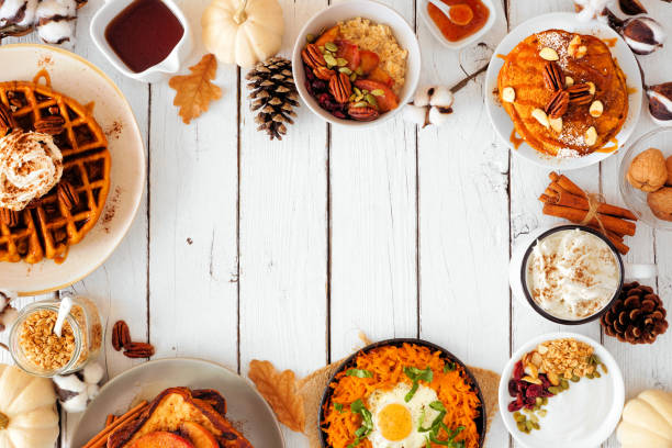 istock Autumn breakfast or brunch buffet frame against a white wood background. Overhead view with copy space. 1278431119