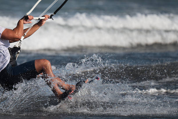 istock Athletic man jump on kite surf board 1278432088