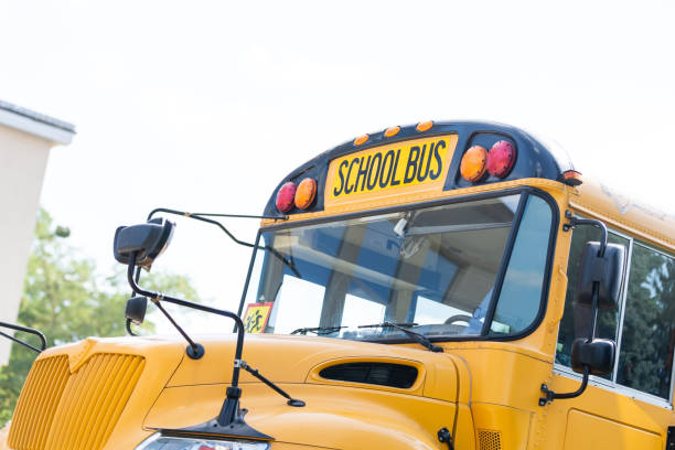 istock Yellow school bus on the street 1278436077