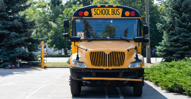 istock Yellow school bus on the street 1278436134