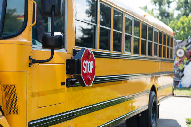 istock Yellow school bus on the street 1278436155
