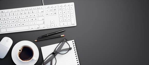 istock Top view of a dark desktop with copy space 1278436431
