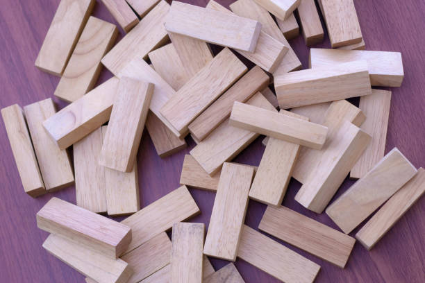 istock Top view wooden blocks game, spread the pile on the table. 1278439796