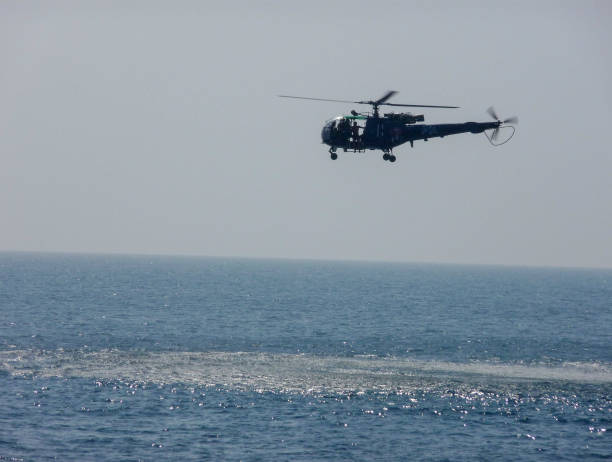 istock THE FLYING HELICOPTER IN THE MID SEA 1278441495