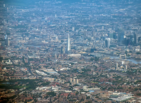 Overlooking the urban sprawl of the city of London from an airplane