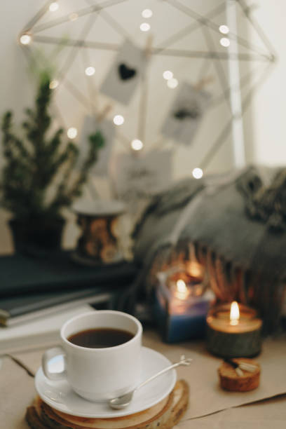 istock autumn home layout with a candle and a Cup of coffee 1278443258