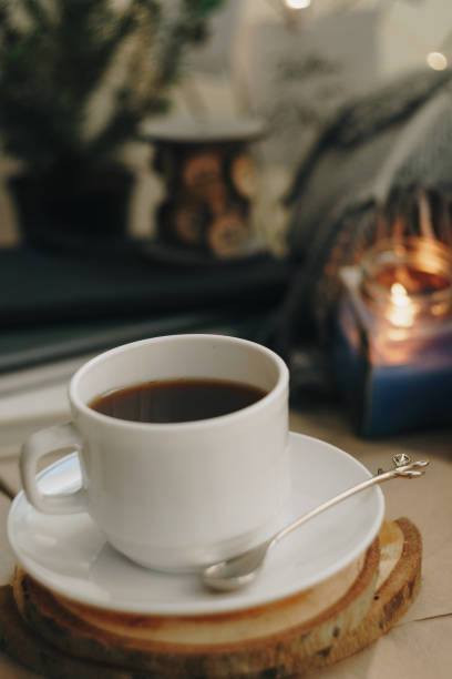 istock autumn home layout with a candle and a Cup of coffee 1278443281