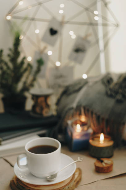istock autumn home layout with a candle and a Cup of coffee 1278443346