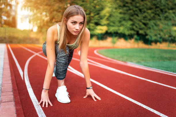 istock Slender girl getting ready to run 1278444675