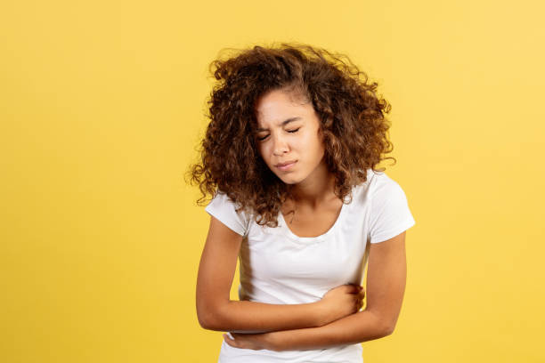 istock Young african american woman on yellow copy space background 1278445155