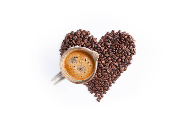 istock Cup of coffee Heart shape coffee beans 1278446135