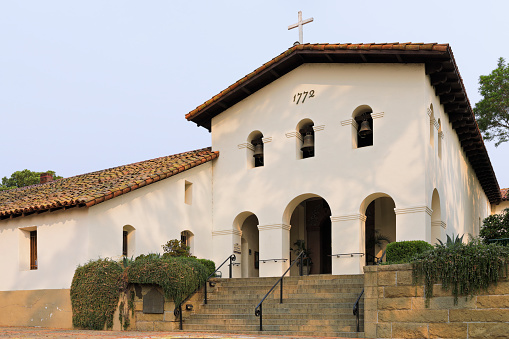 Day time view of Mission San Luis Obispo de Tolosa - a Spanish mission founded in 1772 by Father Junípero Serra in San Luis Obispo, California. The Mission serves as the parish church for the community.