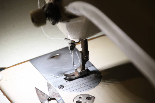 istock Presser foot, needle and thread of the sewing machine 1278449360