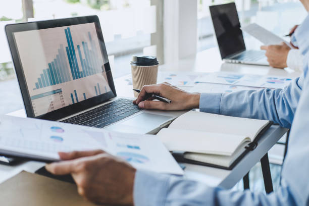 istock Professional Business teamwork conference project success financial statistics growth profit, Partner meeting business investor working start up project for both company with document data graph 1278454432
