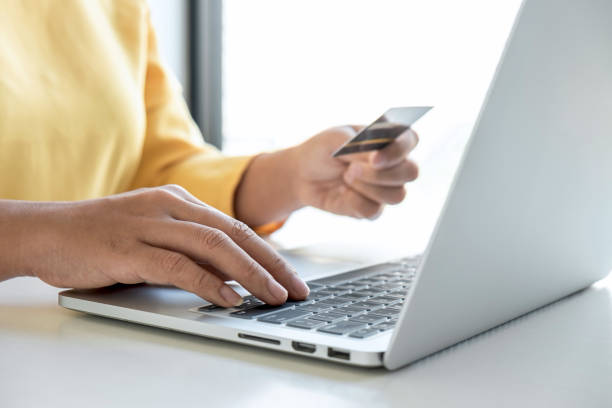 istock Woman using credit card register security code payments online shopping and customer service network connection market, using technology on laptop, Internet Online shopping or banking concept 1278454548