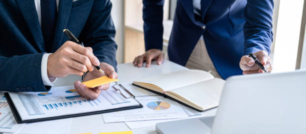 istock Business team meeting to conference, collaboration discussing working analyzing with financial data and marketing business strategy project, presentation and brainstorming to making profit of company 1278454559
