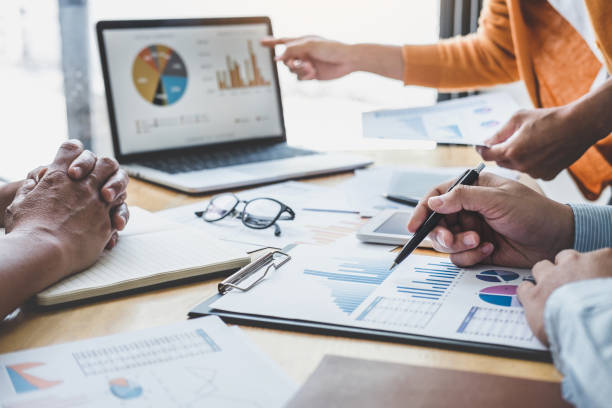 istock Business team collaboration discussing working analyzing with financial data and marketing growth report graph in team, presentation and brainstorming to strategy planning making profit of company 1278455253