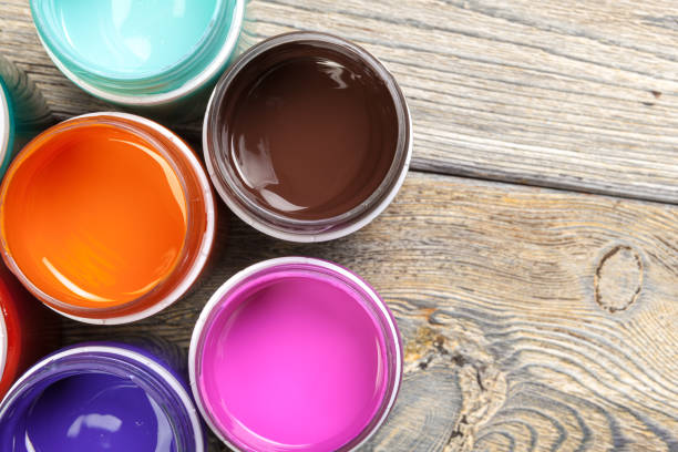 istock paint bottels on rustic wooden background. High quality photo 1278456838