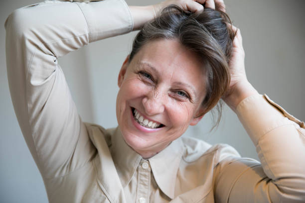 istock Smiling business woman working in office 1278457006