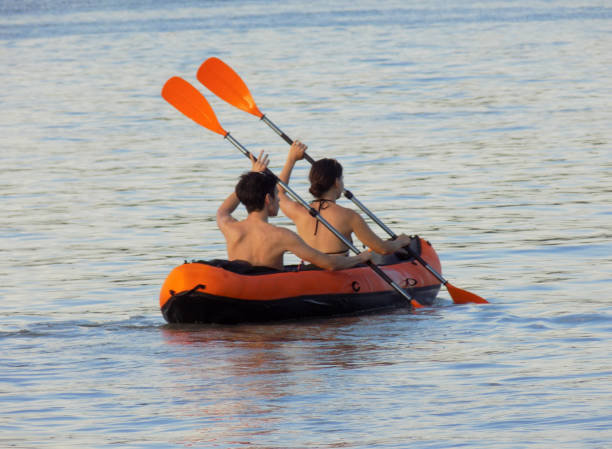 istock Young couple kayaks at dusk 1278458554