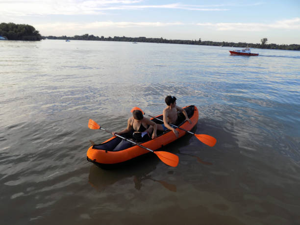 istock Young couple kayaks at dusk 1278458555