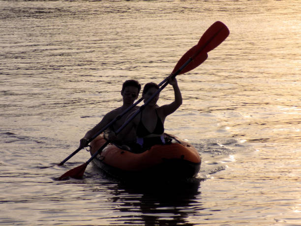 istock Young couple kayaks at dusk 1278458558