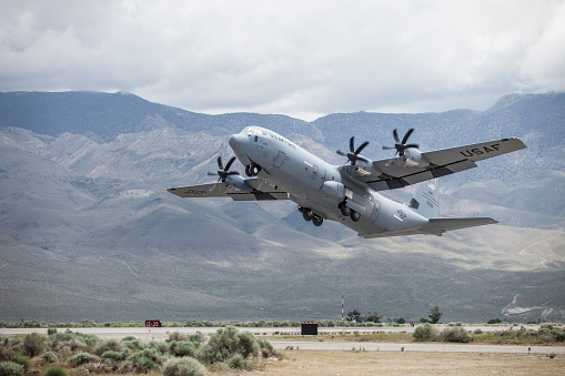 May 08, 2017, United States Airforce and Marine Corps Lockheed C-130 Hercules, aircraft conducting high altitude take-offs and landings at Bishop Airport (KBIH), Bishop California, USA.
