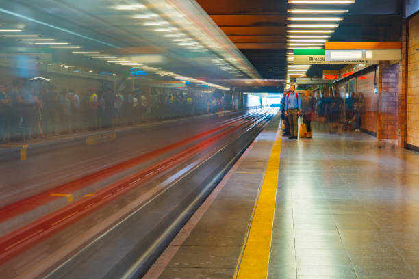 Barcelona-Spain, November 28, 2024. The bustling entrance of Barcelona's metro station showcases the city's vibrant atmosphere and modern architecture