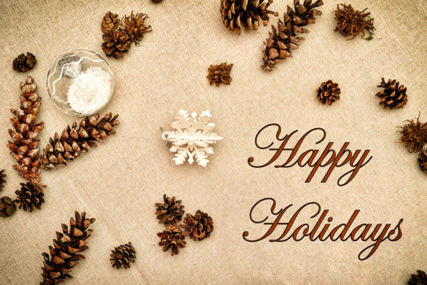istock Christmas decoration with Happy Holidays message on the table 1278463401