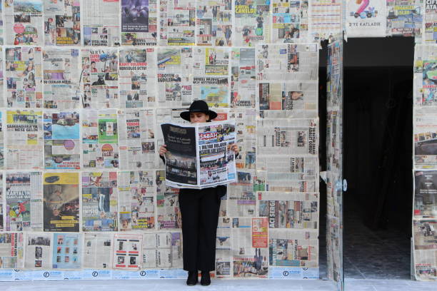 Newspaper at front door.