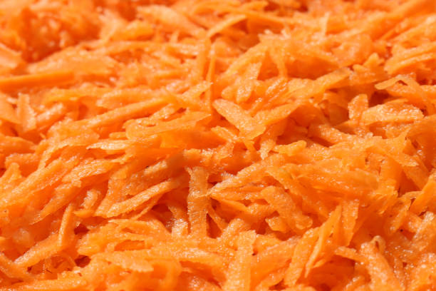 istock Carrots, grated on a large grater. Food background. 1278465382