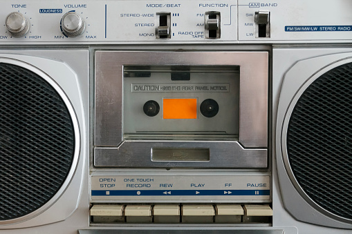 Close-up vintage radio and cassette tape recorder