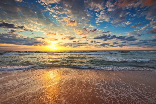 istock Beach sunrise over the tropical sea 1278469683
