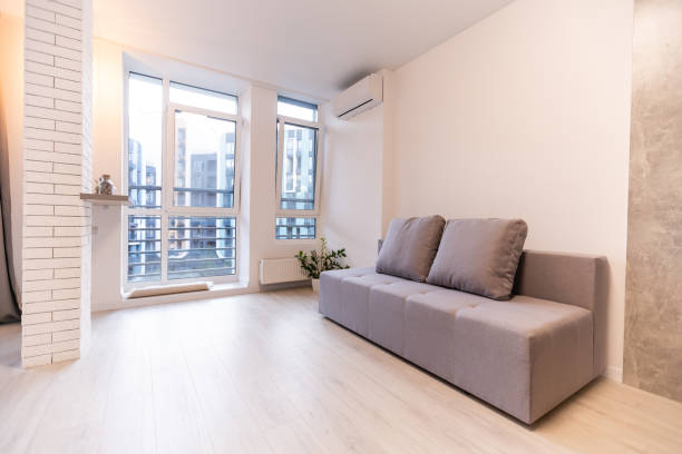 istock New cozy couch in modern room interior 1278470952