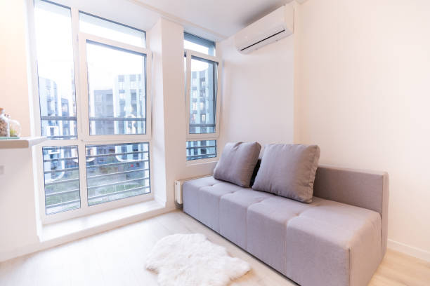 istock New cozy couch in modern room interior 1278471084